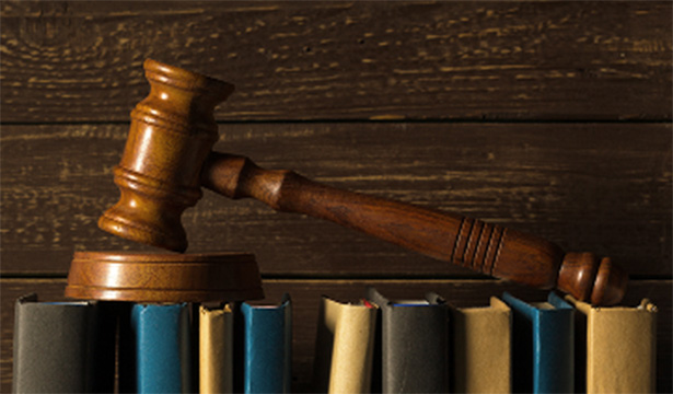 gavel on books